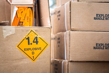 Explosive triangle placard sign on the carton box, to demonstrate the dangerous material inside....
