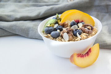 Oatmeal porridge with blueberries. Superfood for healthy nutritious breakfast