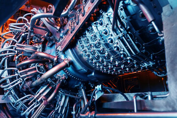 Gas turbine engine, located with internal structural elements, hoses, cylinders and housings