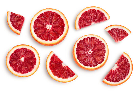 Blood red oranges slices isolated on white background with clipping path. Top view. Flat lay