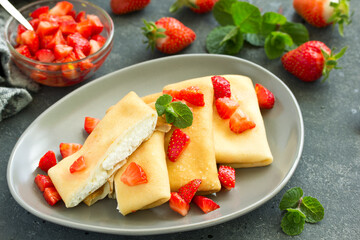 Pancakes with cottage cheese with strawberries. Selective focus