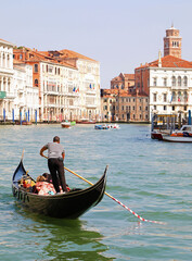 Fototapeta na wymiar Gondola in Canal Grande, Venice