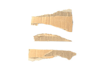 Recycled paper craft stick on a white background. Brown paper torn or ripped pieces of paper isolated on white background.