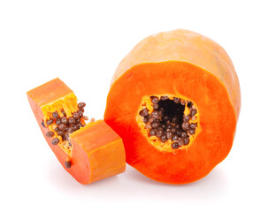 whole and half of ripe papaya fruit with seeds isolated on white background
