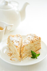 Homemade Napoleon cake with butter cream. Selective focus.