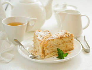 Homemade Napoleon cake with butter cream. Selective focus.