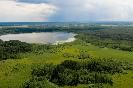 Aerial view of large country lake for fishing, aerial photo. The concept of active, eco-and photo-tourism
