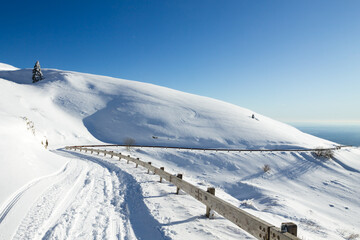 Fototapeta na wymiar Winter landscape, curves road with snow