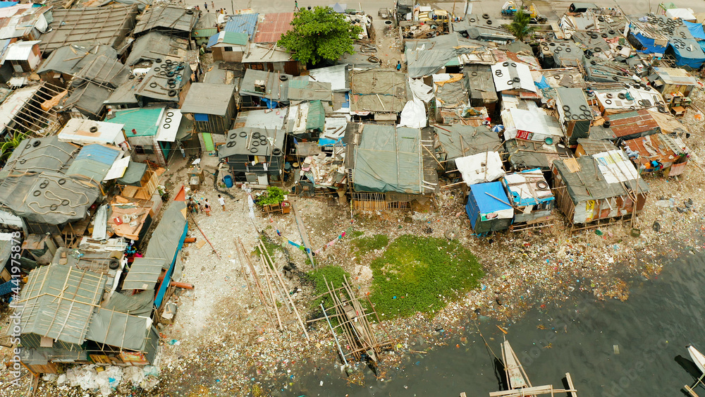 Wall mural slums in manila near the port. river polluted with plastic and garbage. manila, philippines. - Wall murals