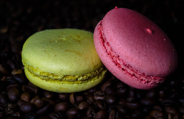 
Macaroon cakes yellow and purple, coffee beans