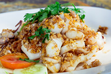 Fried Squid with garlic and Thai herb