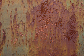 Painted green steel with rusty spots