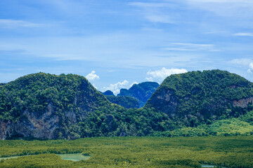 Obraz premium Beauty two mountain multi layer with green tree. high forest fresh air and fog in morning sunrise. Thailand tropical view in natural park.