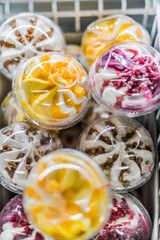 Ice cream products put up for sale in a commercial refrigerator