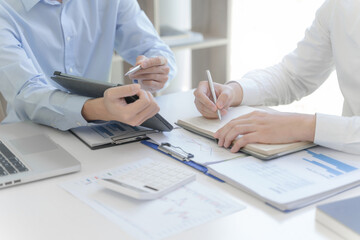 Business investor executive using laptop analyzing value of stock market exchange. Investment planing concept