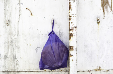 Garbage bag in container