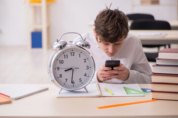 Male pupil in time management concept