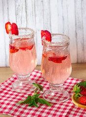 Strawberry and mint lemonade in two glasses