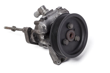 hydraulic power steering pump on a white background engine parts. spare parts catalog from junkyard.