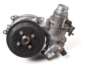 Metal automobile pump for cooling the engine of a water pump on a white background. The concept of...