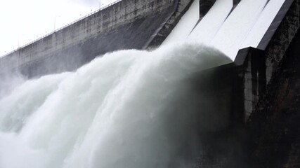 waterfall from the dam on a rainy day.Slow-motion, Close-up shots - Powered by Adobe