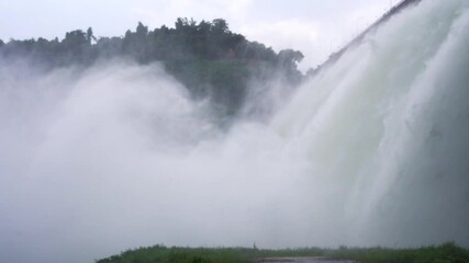 Slow-motion image of water droplets from the dam - Powered by Adobe