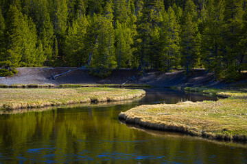 2021-05-10 A WINDING STREAM WITH LUSH BANKS IN YELLOWSTONE NATIONAL PARK