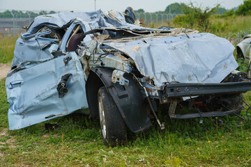 the crushed remains of a car after a British army Challenger 2 FV4034 tank has deliberately driven...