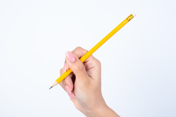 Woman's hand with pink manicure over isolated white background 
