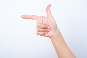 hand pointing with finger aside.