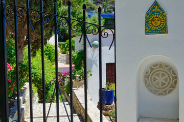 Decorated entrance to the garden of a Mediterranean-style house on the coast of Andalusia (Spain)
