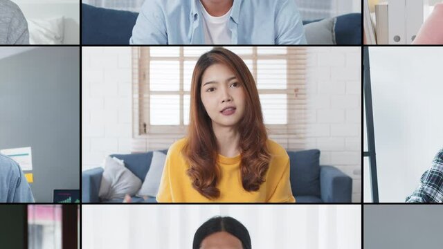 Group of young Asian business people, office coworker on video online conference call, remote team meeting. Work from home, internet communication technology, coronavirus social distancing lifestyle