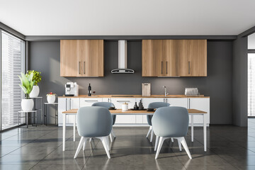 Front view of panoramic wooden half white kitchen, blue chairs