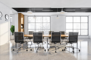 Office table with chairs in the interior with wooden design elements