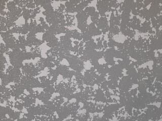 Textured putty in gray-white color.