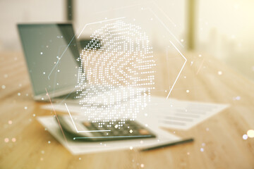 Abstract virtual fingerprint illustration on blurry calculator and computer background, personal biometric data concept. Multiexposure