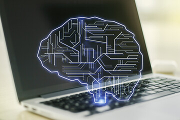 Double exposure of creative artificial Intelligence symbol with modern laptop on background. Neural networks and machine learning concept