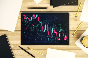 Creative abstract global crisis chart with world map sketch on modern digital tablet screen, falling markets and collapse of global economy concept. Top view. 3D Rendering