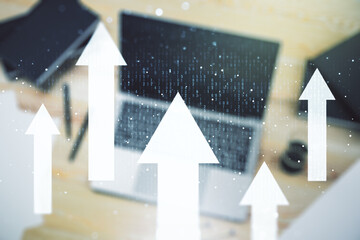 Double exposure of creative abstract upward arrows hologram on laptop background. Ambition and challenge concept