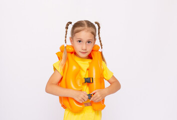 Portrait of smiling little girl in lifejacket