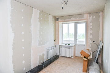 Interior renovation of a residential apartment using drywall without painting.