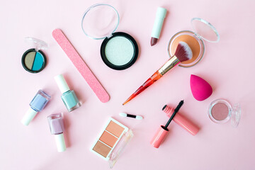 professional makeup tools. Makeup products on a colored background top view. A set of various products for makeup.