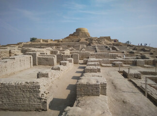 Mohenjo daro. Stupa and great bath of Mohenjo-Daro. Archaeological site of Indus valley civilization, located in Sindh, Pakistan. Harappa and Mohenjo Daro are archaeologically related sites. 
