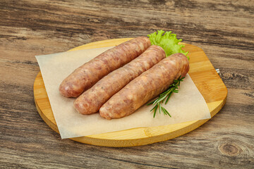 Raw pork meat sausages for grill