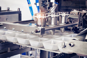 Conveyor Filling and Packaging Machine for Food. product packaging concept