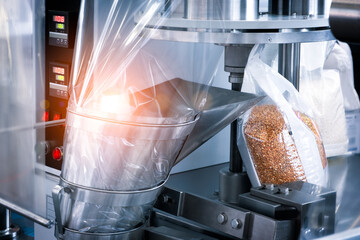 Conveyor Filling and Packaging Machine for Food. product packaging concept, buckwheat groats