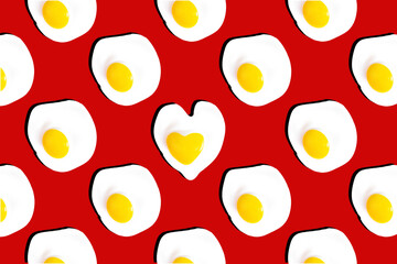 Oval-shaped scrambled eggs pattern with heart-shaped scrambled eggs in the middle. Healthy food concept. Love concept.