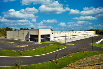 Exterior of white generic business warehouse industrial building