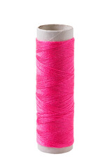 One reel of pink threads, isolated on a white background