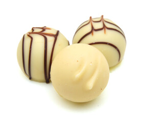 Chocolate candies collection. Beautiful Belgian truffles isolated on white background